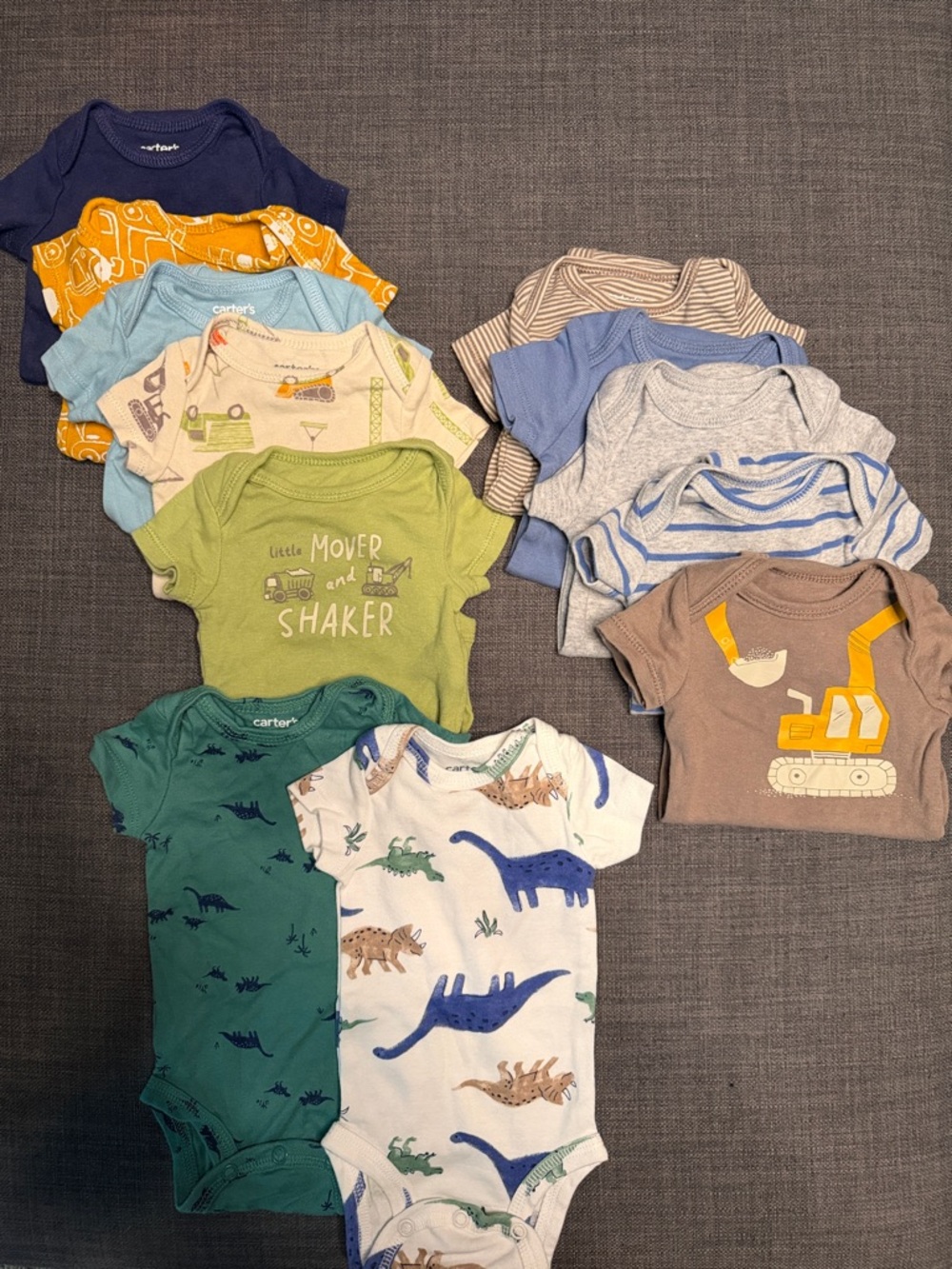 12 Carter’s bodysuits